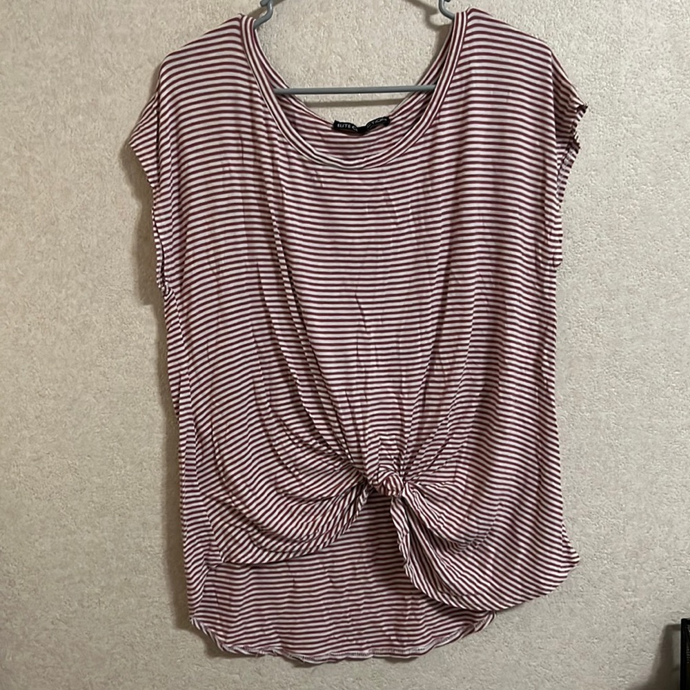 This is a pink/white striped tee w/knot in the front and super short sleeves.